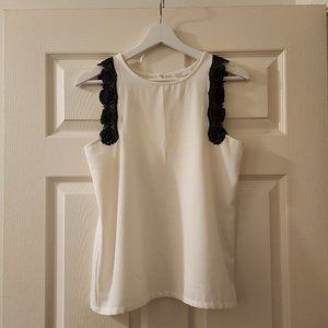 White Sleeveless Blouse with Black Lace Detail